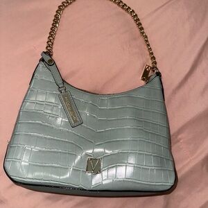 Light green Victoria’s Secret hand bag with adjustable straps